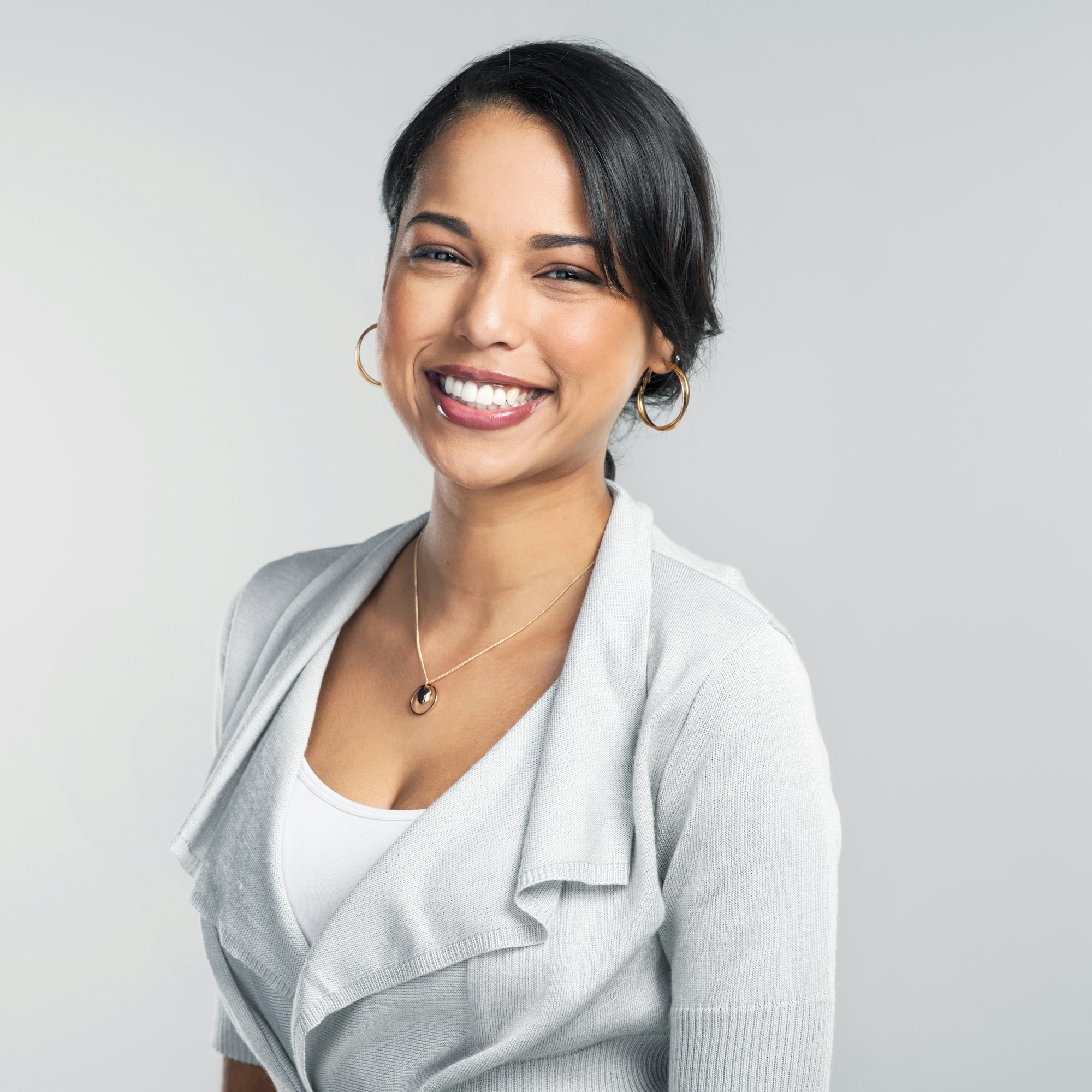 studio-shot-of-a-confident-young-businesswoman-posing-against-a-grey-background.jpg - Loan Select Australia Home & Investment Loans | Loan Select Australia